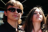 Prince Jackson (L), Paris Jackson (R) and Blanket Jackson (front) attend a ceremony to honour their father