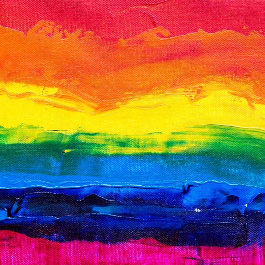 A rainbow coloured block
