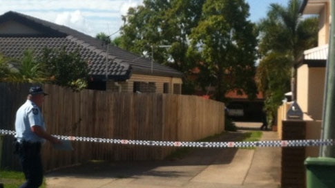 Police have cordoned off the driveway to a townhouse in Meadow Street, North Mackay.