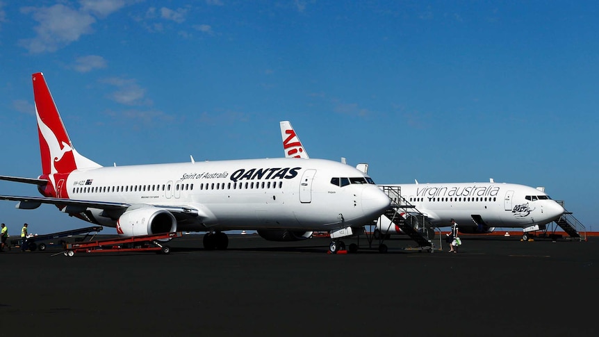 Planes on a tarmac at airport.