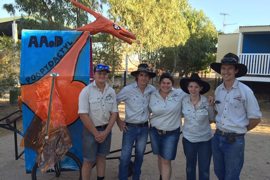 Australian Age of Dinosaur Museum staff with their entry in the national dunny derby at Winton