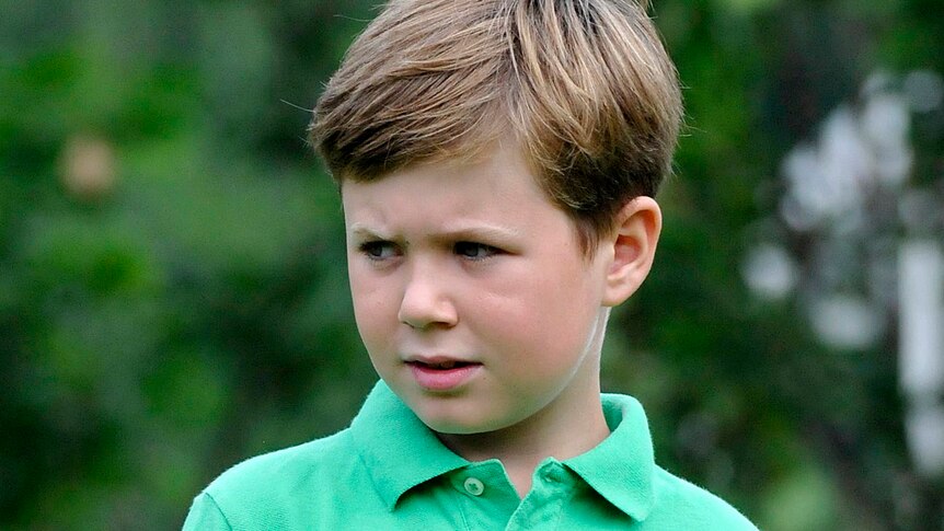 Head and shoulders, non-smiling photo of Prince Christian of Denmark looking slightly off-camera.