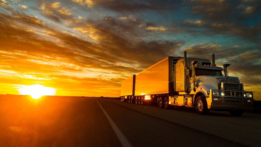 A truck on a remote highway in outback Australia