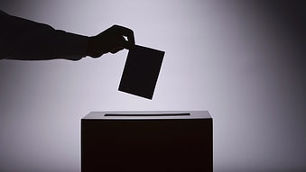 Person voting (Thinkstock: Comstock)