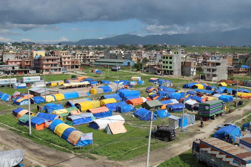 Families who lost their homes are still living under tarps in Kathmandu