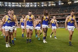 West Coast players leave the field looking dejected after their lose to the Cats.