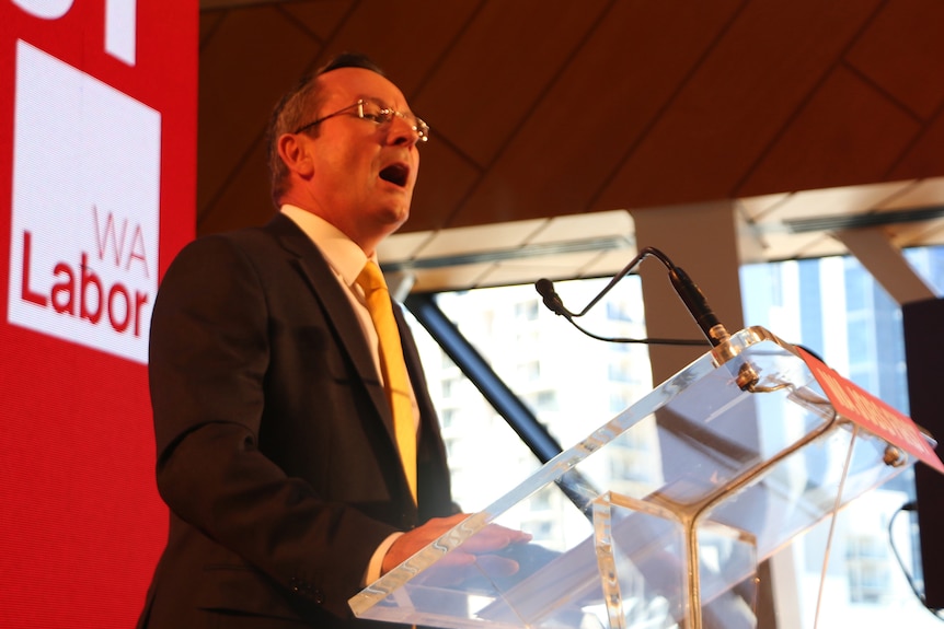 Mark McGowan speaking at a lectern in front of a WA Labor backdrop.