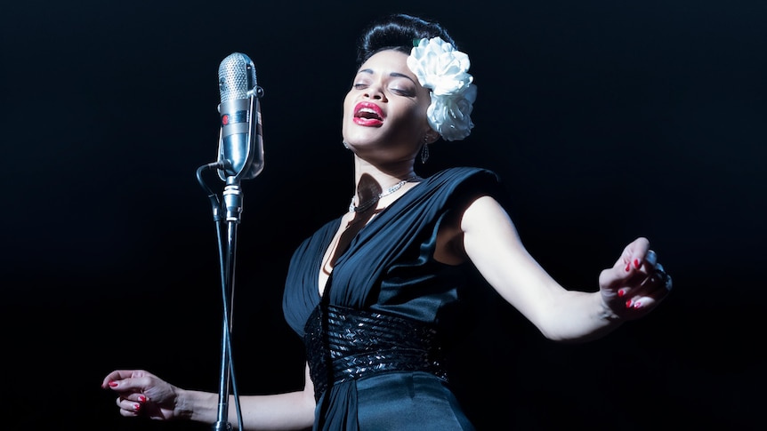 Film still of Andra Day as Billie Holliday singing on stage from The United States vs Billie Holiday