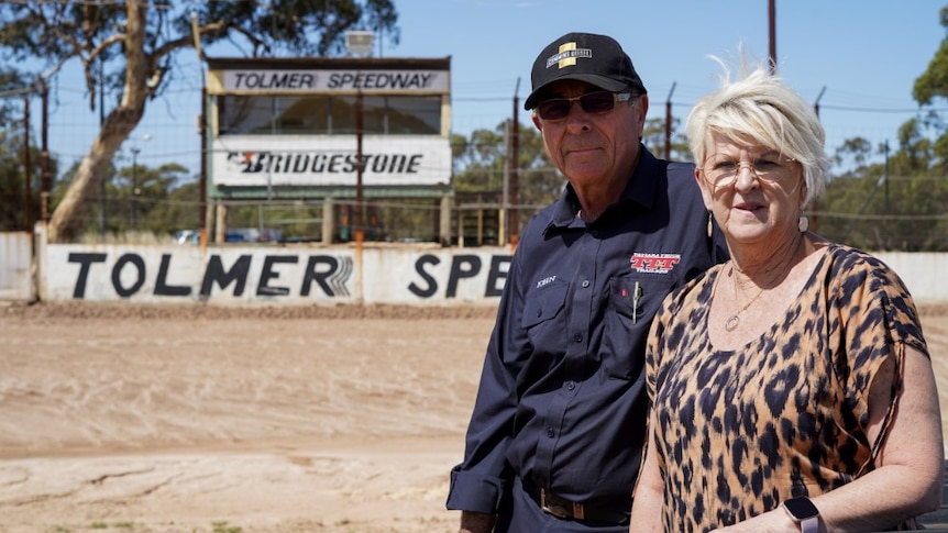 Married couple Ann and Jenkin stand on the track they helped run at Tolmer Speedway in Bordertown.