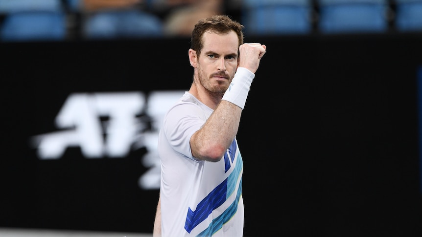 Australian tennis player Andy Murray raises fist in the air after beating Great Britain's Reilly Opelka at Sydney Tennis Classic