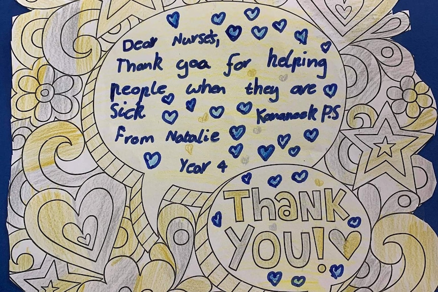 A letter with printed flowers and hearts written on by a Year 4 student thanking nurses.