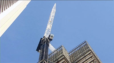A crane towers above the Sydney skyline.