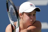 Ashleigh Barty returns against Sloane Stephens at US Open