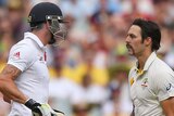 England's Kevin Pietersen (L) and Australia's Mitchell Johnson clash on day three at the MCG.