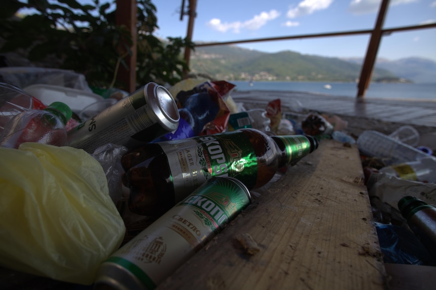 Cans and bottles near a beac