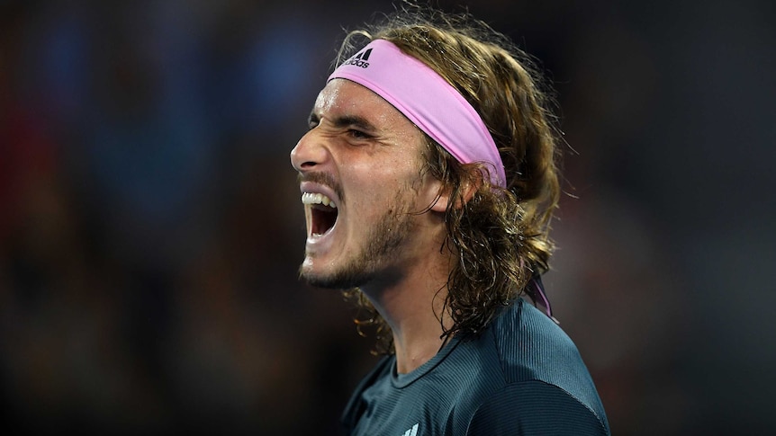 Tennis player roars in frustration after a point at the Australian Open.