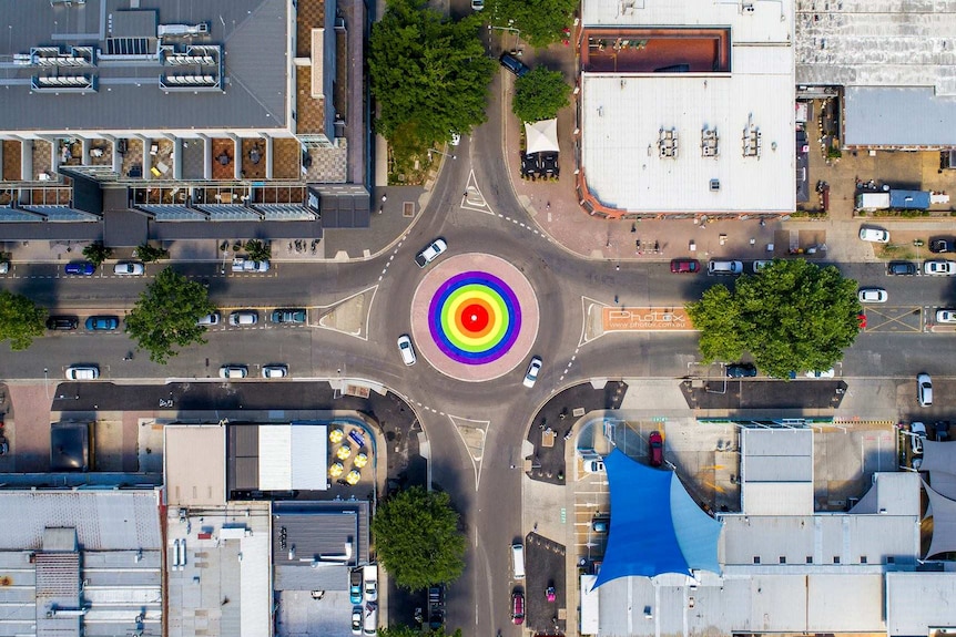 An aerial view of a rainbow roundabout