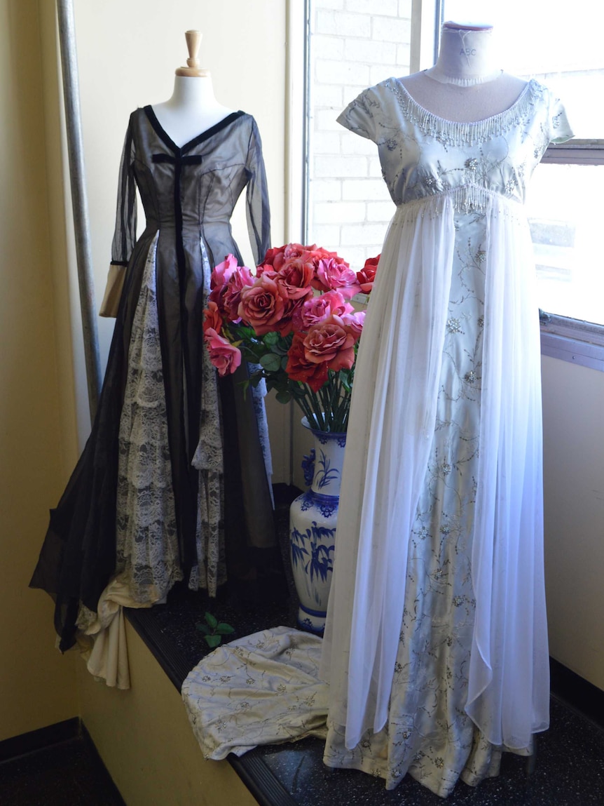 A black and a white gown displayed in the wardrobe store dating back to the start of television in Australia.