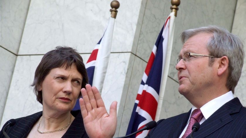 Helen Clark looks on as Kevin Rudd makes a point