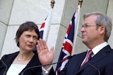 Helen Clark looks on as Kevin Rudd makes a point