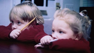 Schoolchildren sit in class