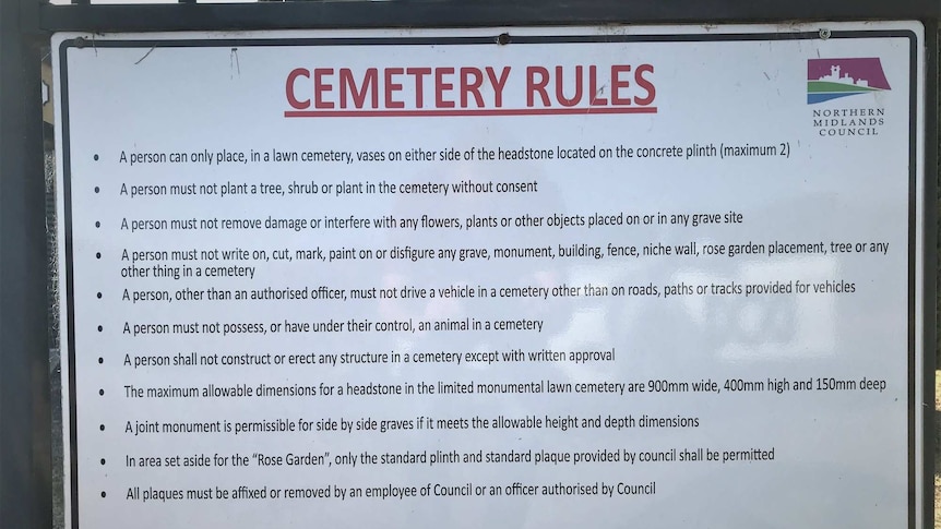 Signage at cemetery of 'rules' for use.