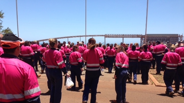 Mine workers don pink shirts
