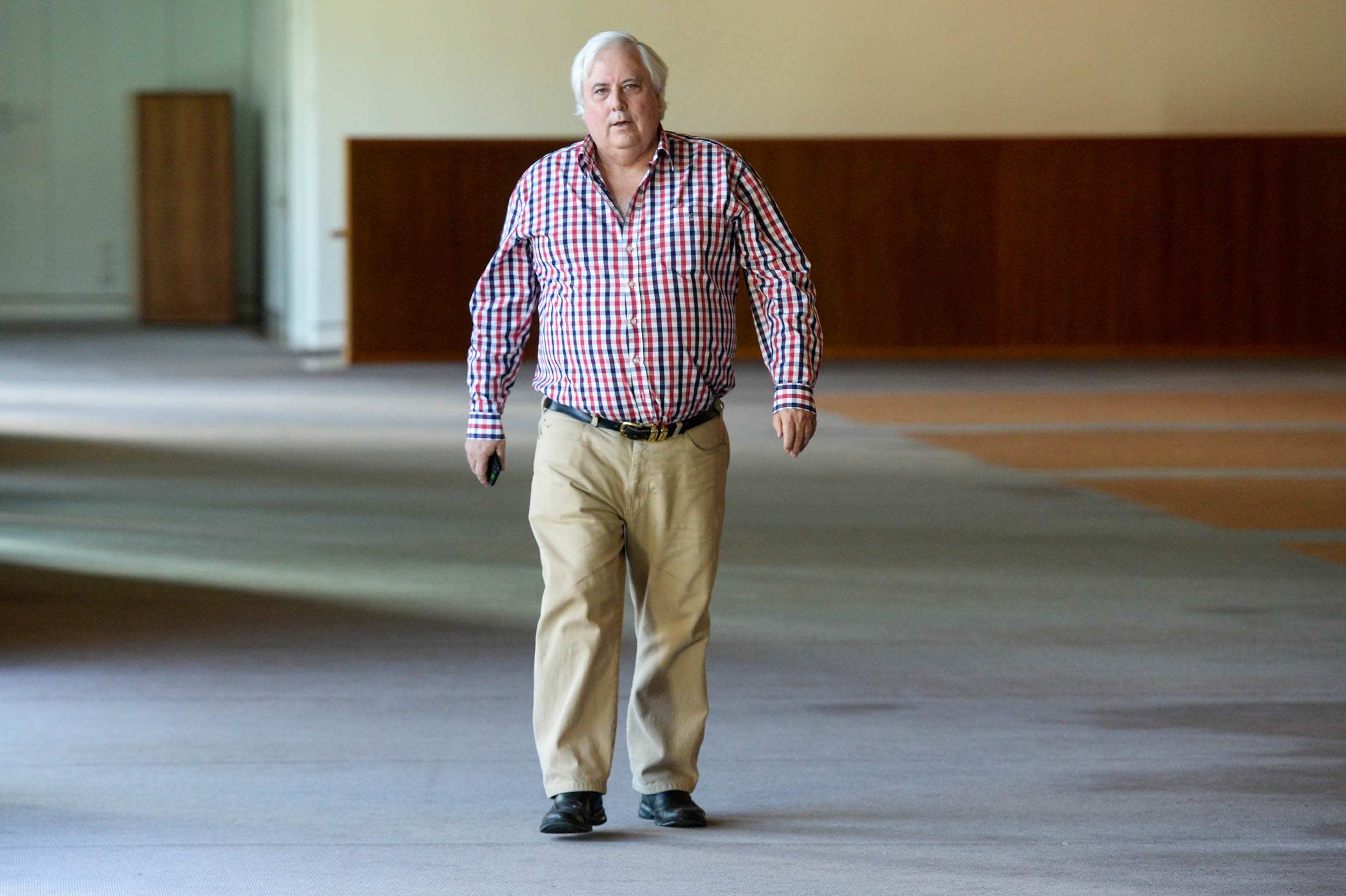 Clive Palmer under fire for not turning up to economics committee