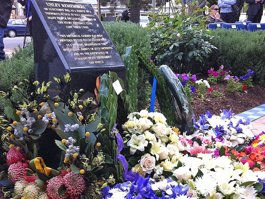 Floral tributes to those who died a decade ago