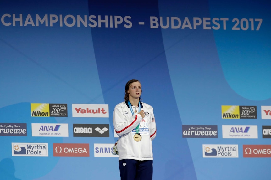 Katie Ledecky on the world championship podium after the 1,500 metres