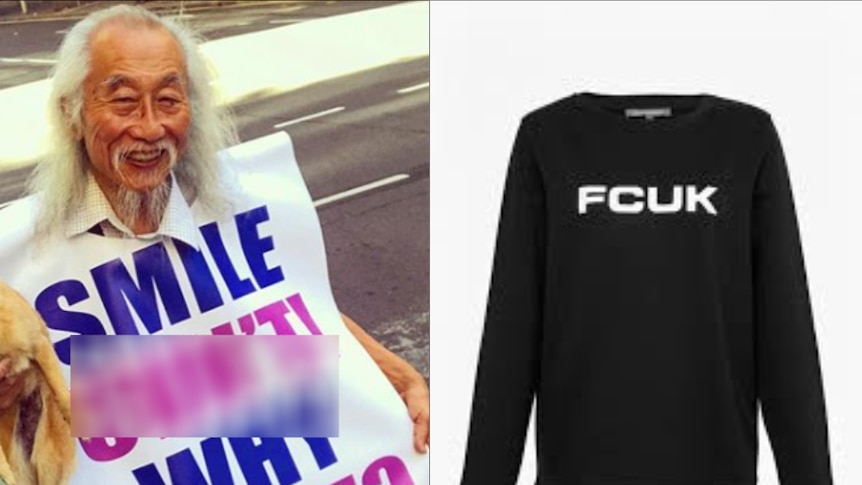 A man wearing a sign next to a picture of a jumper with the words FCUK.