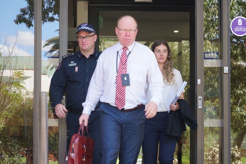 A lawyer leaves a courthouse in Alice Springs. 