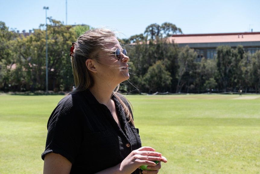Grace Blackburn at UWA's James Oval with the magpies.