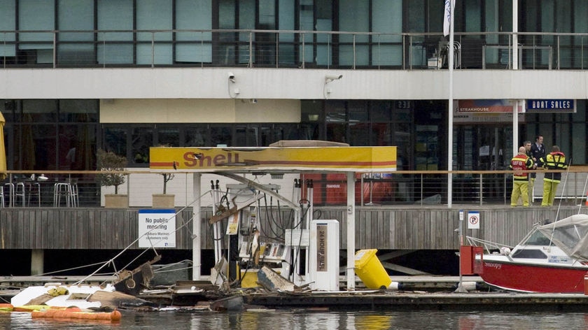Emergency services personnel at the scene of the Port Melbourne boat explosion