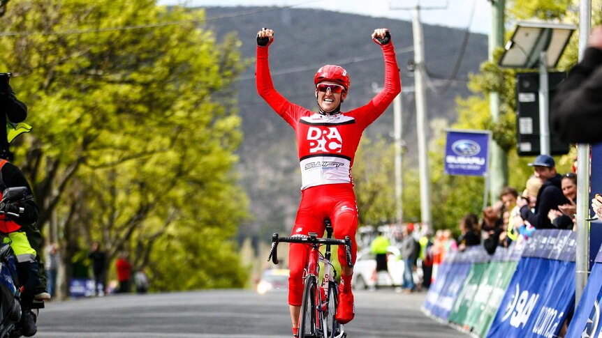 Launceston's Wesley Sulzberger celebrates after stage win in Tour of Tasmania.