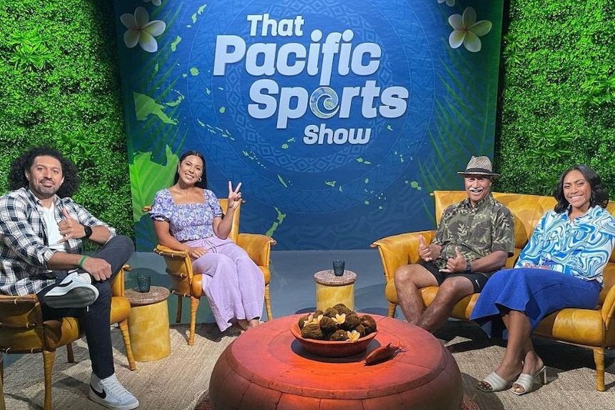 Tiana Penitani sits with three co-hosts on set of That Pacific Sports Show.