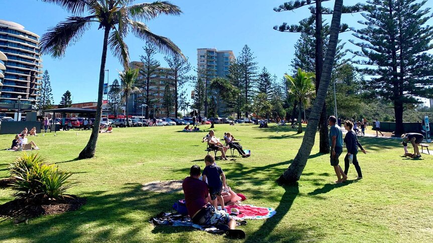 People in the park near Burleigh beach on Queensland's Gold Coast.