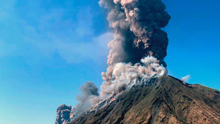 Smoke billows from the volcano on the Italian island of Stromboli.