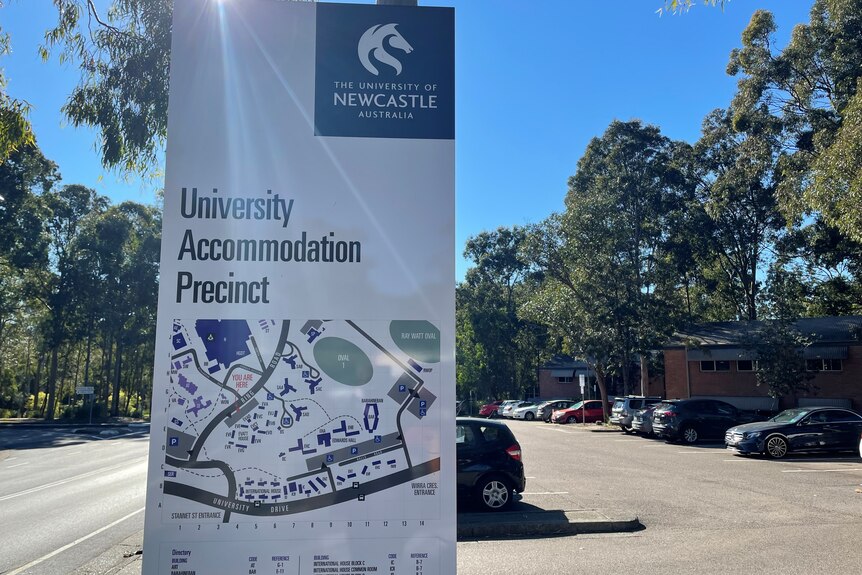 An image of a sign that says "university accommodation precinct".