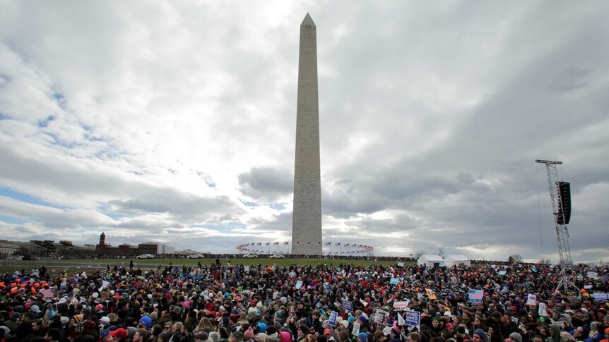 A massive crowd gathered around the Washington Monument.