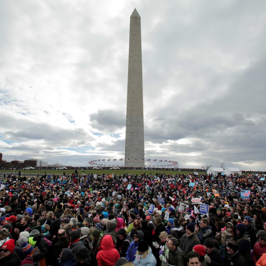 A massive crowd gathered around the Washington Monument.
