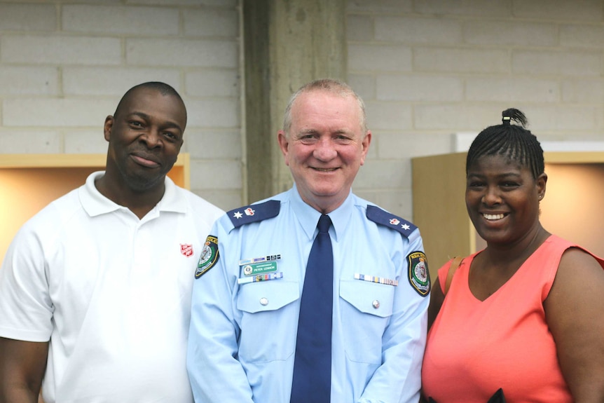 NSW Police Superintendent Peter Lennon with members of the Fairfield community