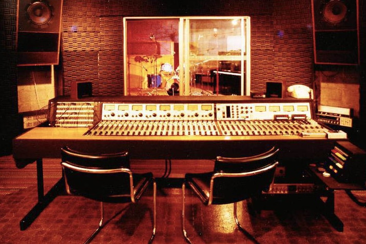 View of an audio mixing desk inside recording studio.