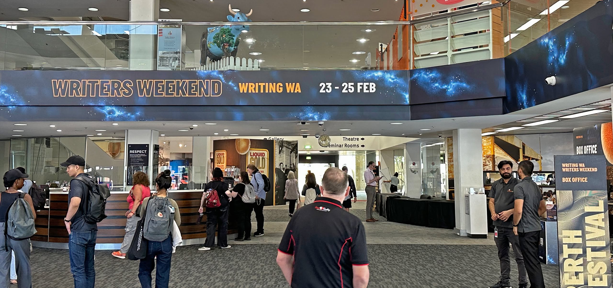 State library foyer with writers weekend signage