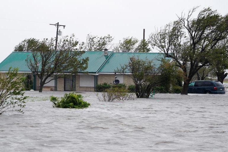 A ranch house surrounded by floodwaters near Port Lavaca, Texas.