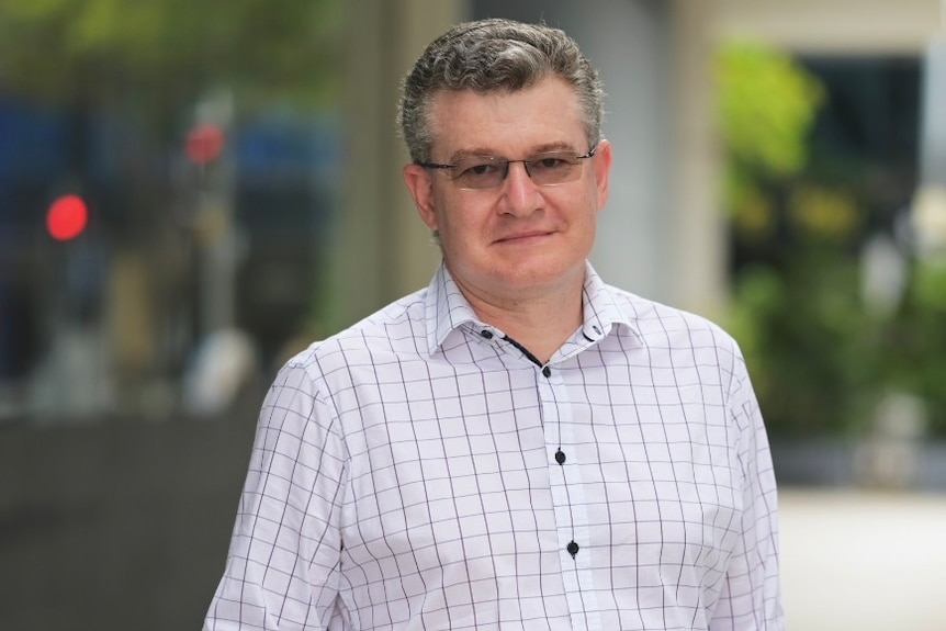 Dr Pierre Benckendorff standing in a Brisbane street