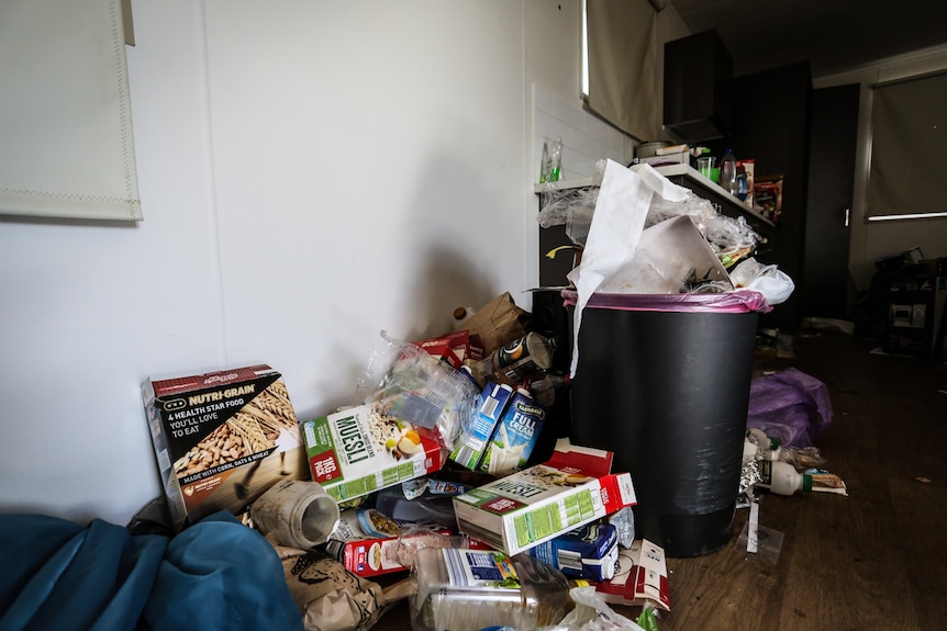 Warwick Allen's overflowing rubbish bin.