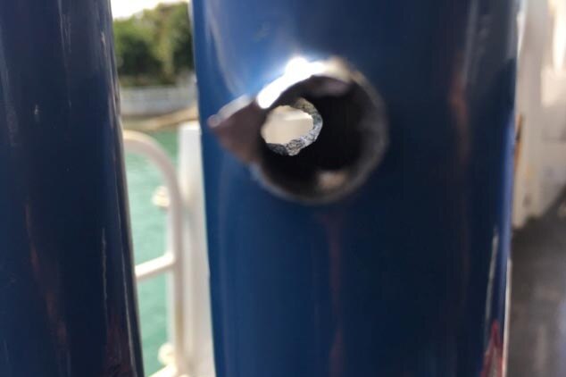 A bullet hole in the boat in Solomon Islands