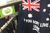 Aust flag T-shirt 'if you don't love it, leave' in Woolworths store in Cairns in far north Qld