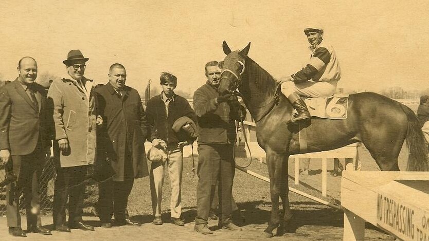 An old photo of a winning racehorse at Suffolk Downs in the US